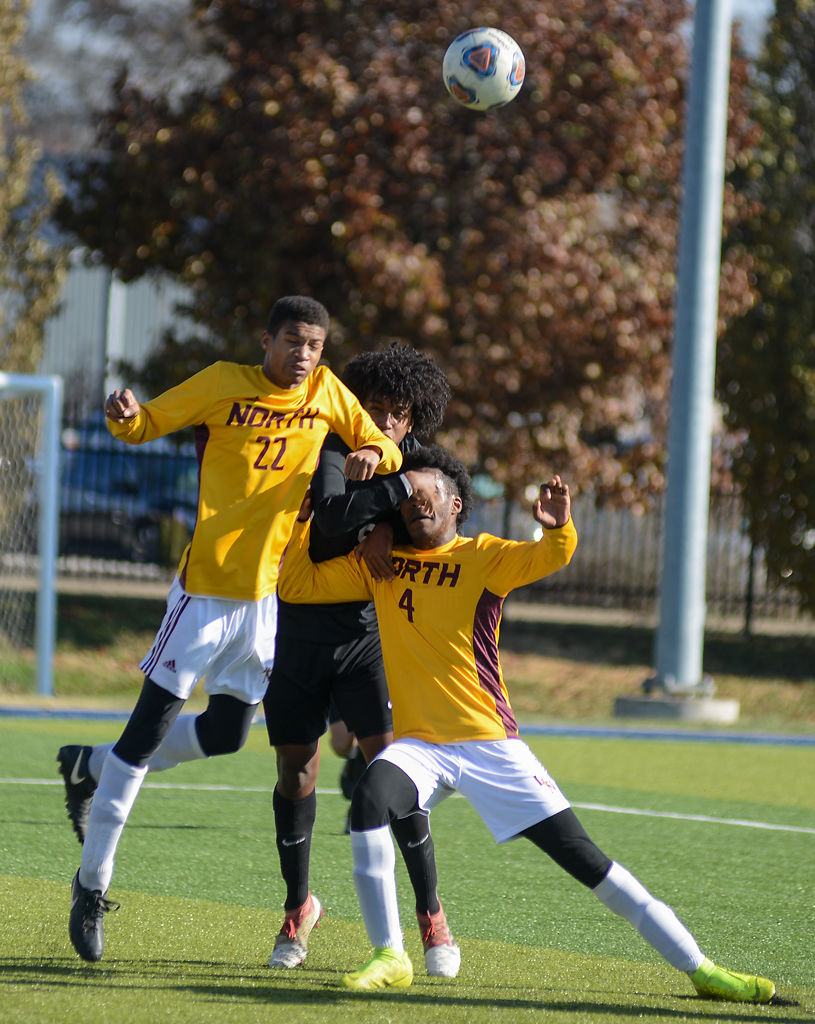 Lutheran North High School players Jalik Smith (22) and Dylan Williams (4) defend a corner against Lael Haile